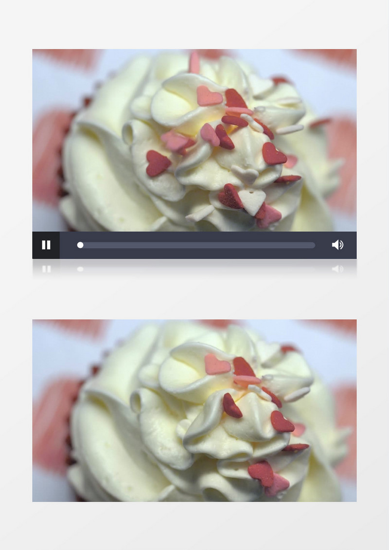 特写唯美心形糖果掉在蛋糕的香草糖衣上实拍视频素材