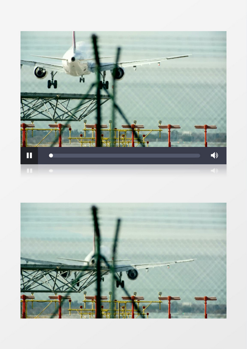 从金属网拍一架商用飞机降落在机场跑道上实拍视频素材