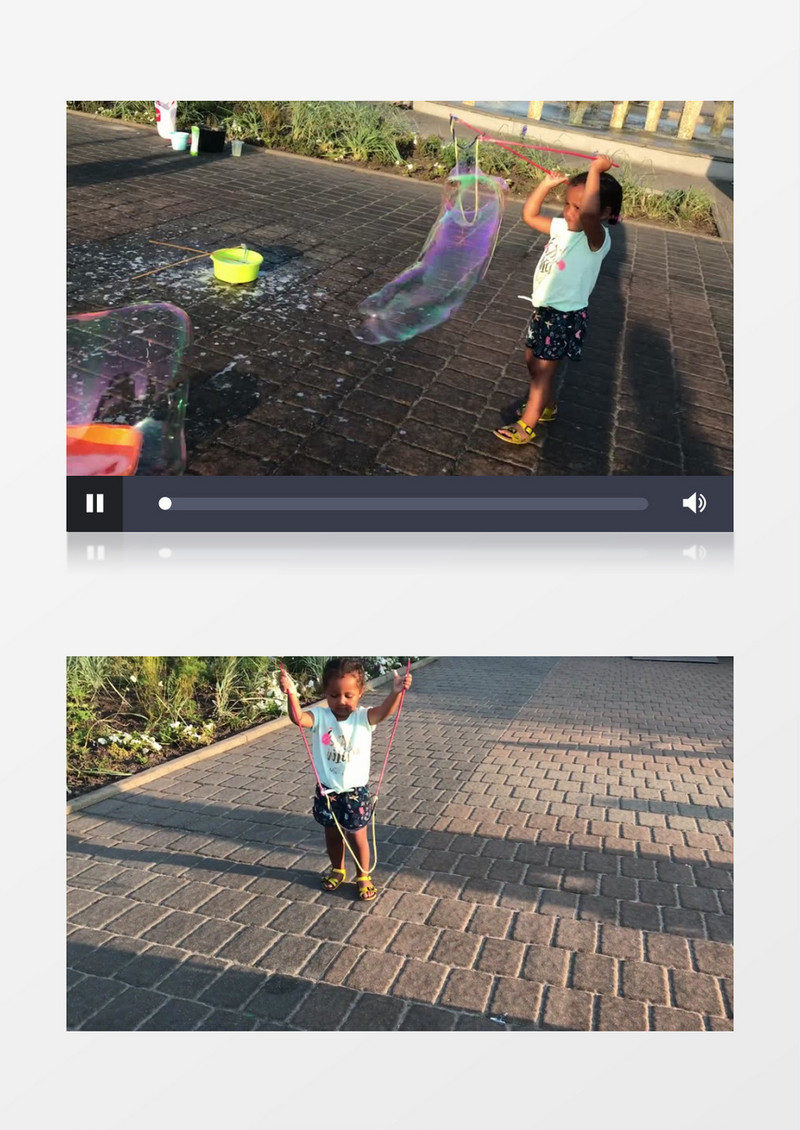小女孩在路边吹大大的泡泡实拍视频素材