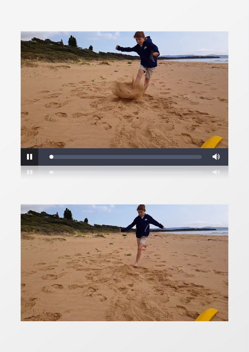 小男孩在海边踢散小沙丘实拍视频素材