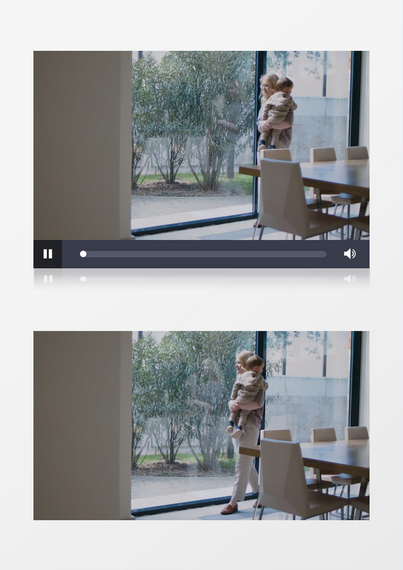 妈妈抱着宝宝站在落地窗前实拍视频素材