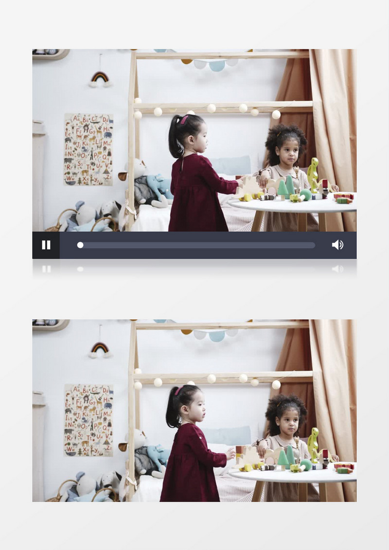 两个小女孩在矮桌旁边玩玩具实拍视频素材