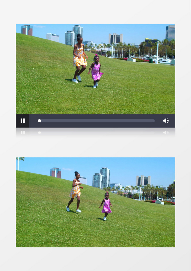两个小女孩在高处的草地上跑下来实拍视频素材