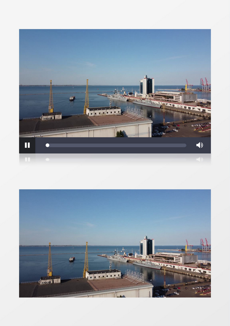 航拍海中的码头和行驶的货轮实拍视频素材