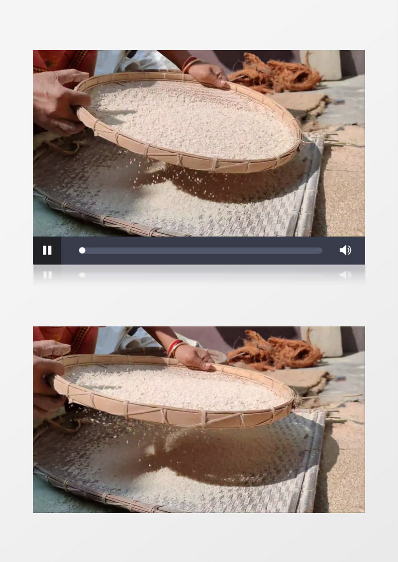 女人在用簸箕筛大米实拍视频素材