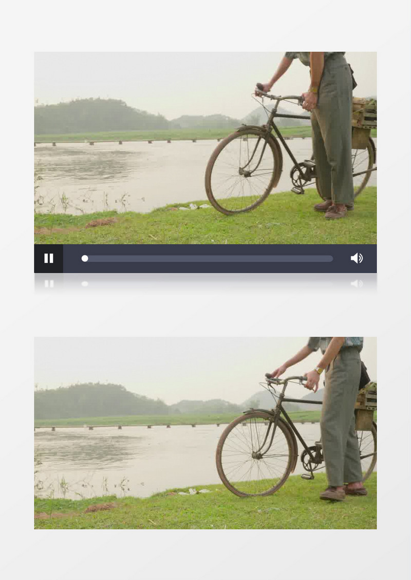 男人在河边推着一辆老式自行车走开实拍视频素材