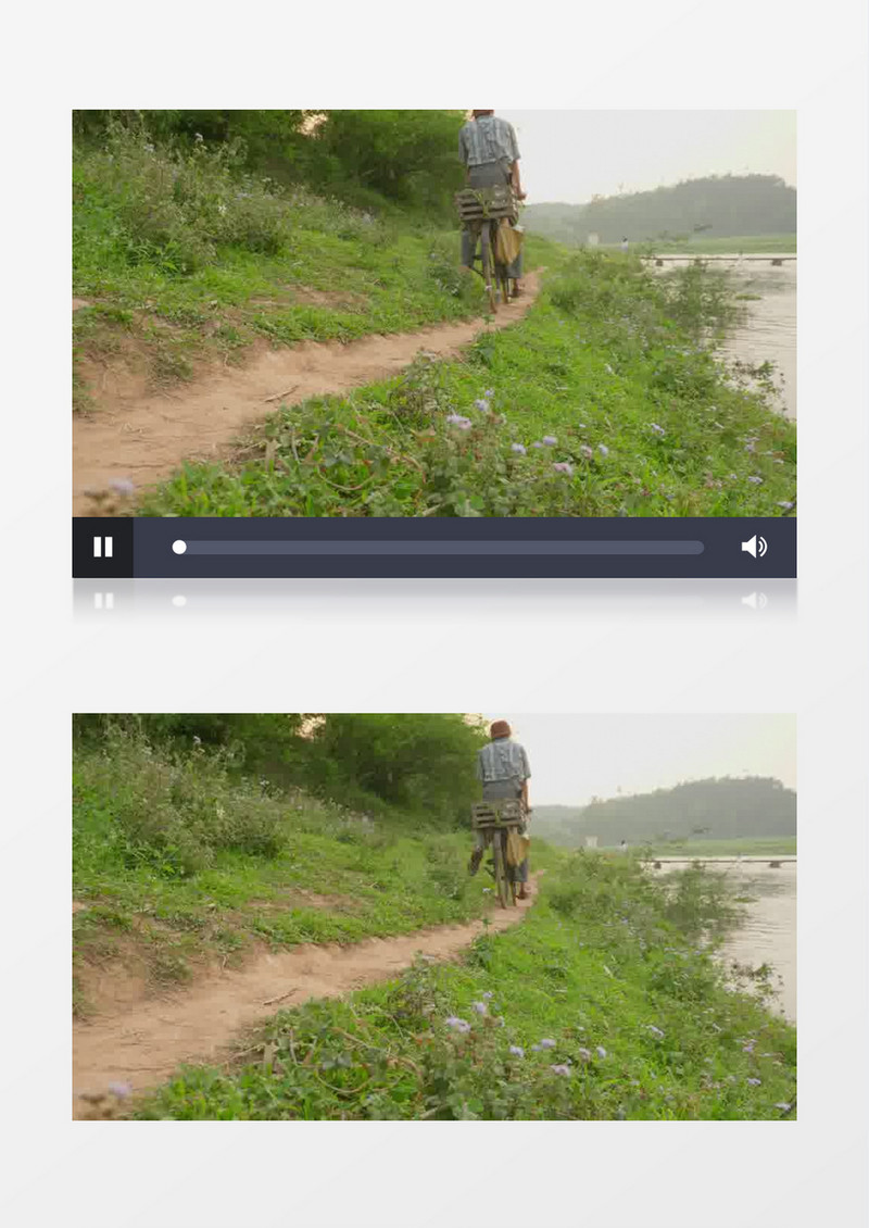 男人缓缓的骑自行车经过河边的羊肠小道实拍视频素材