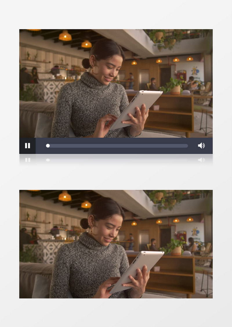 女子在咖啡店用她的平板电脑工作实拍视频素材