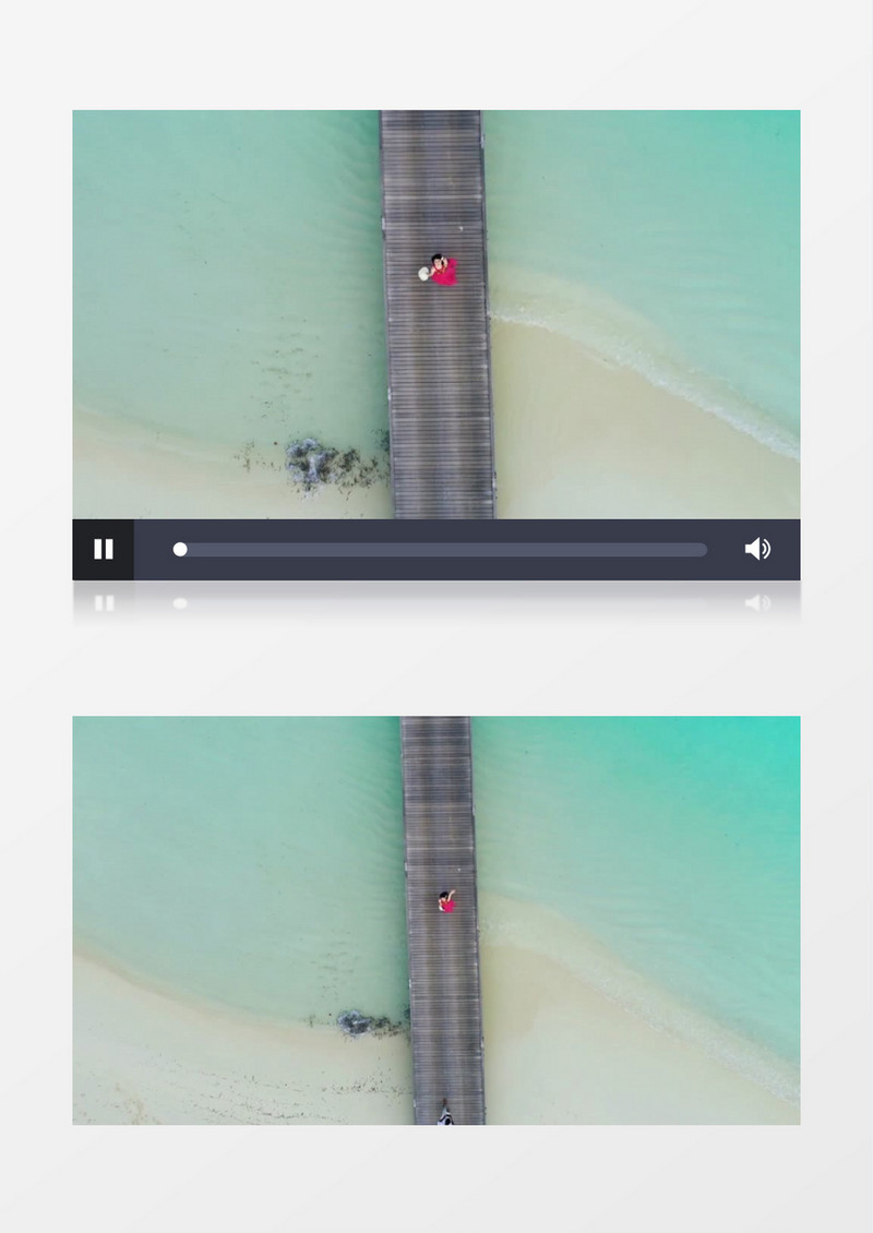 高空俯拍海边的红衣女孩实拍视频素材
