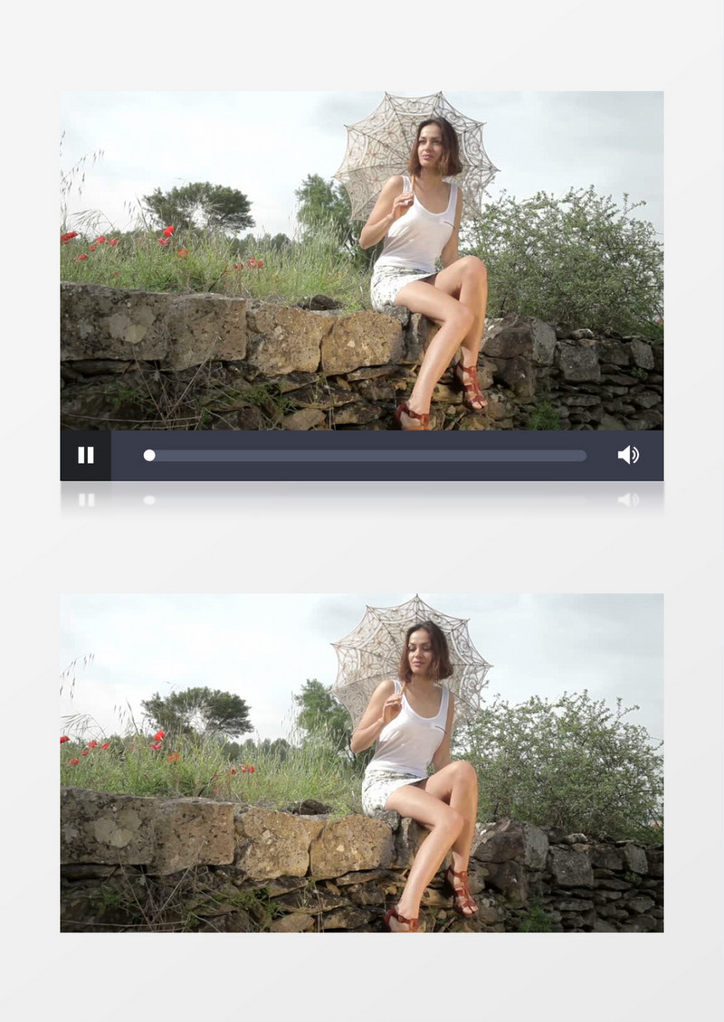坐在石头上转动太阳花伞的白衣女人实拍视频素材