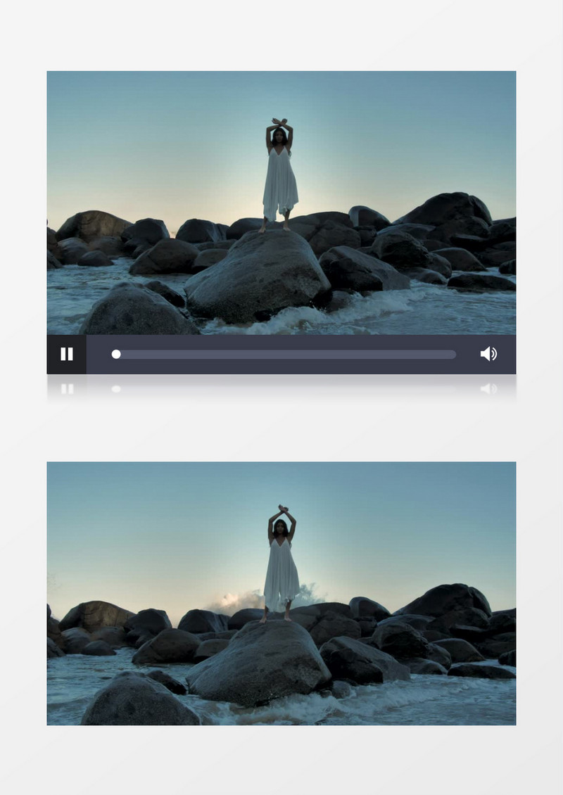 穿着白色连衣裙的女孩在海边礁石上舞动实拍视频素材