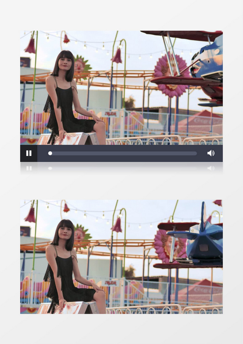  黑发美女坐在游乐场里实拍视频素材