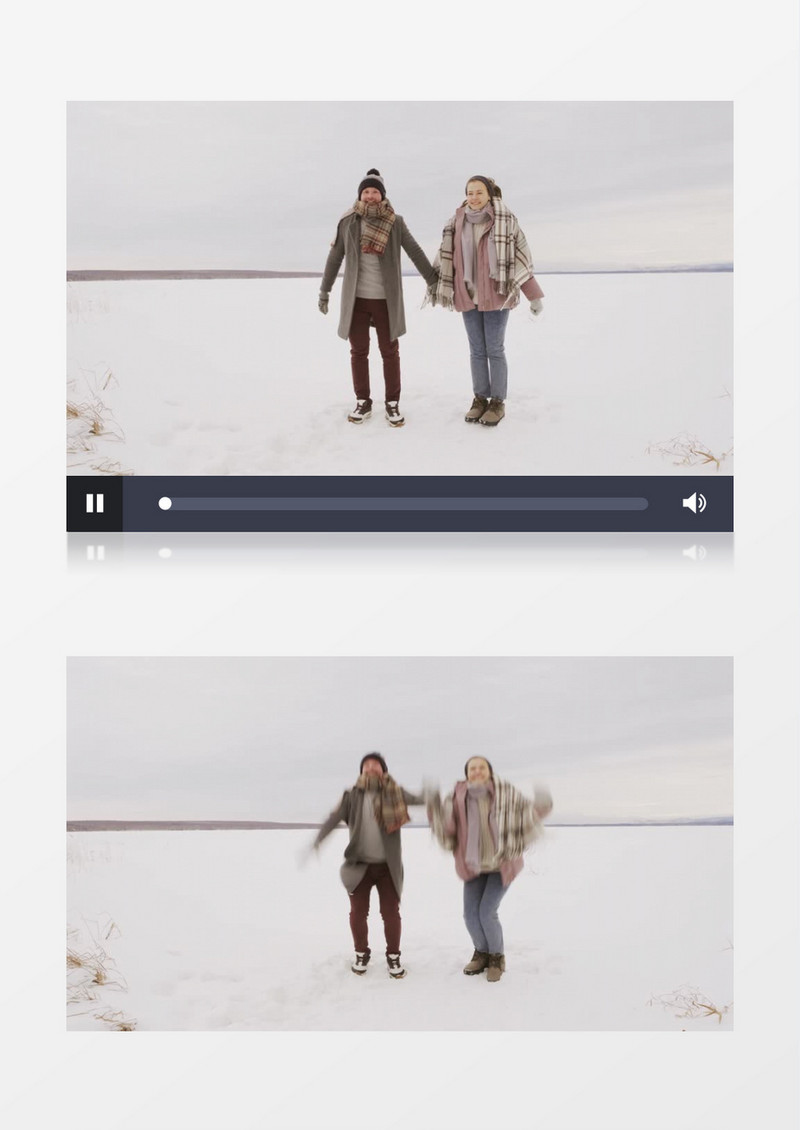 一对情侣在雪地跳跃拥抱实拍视频素材