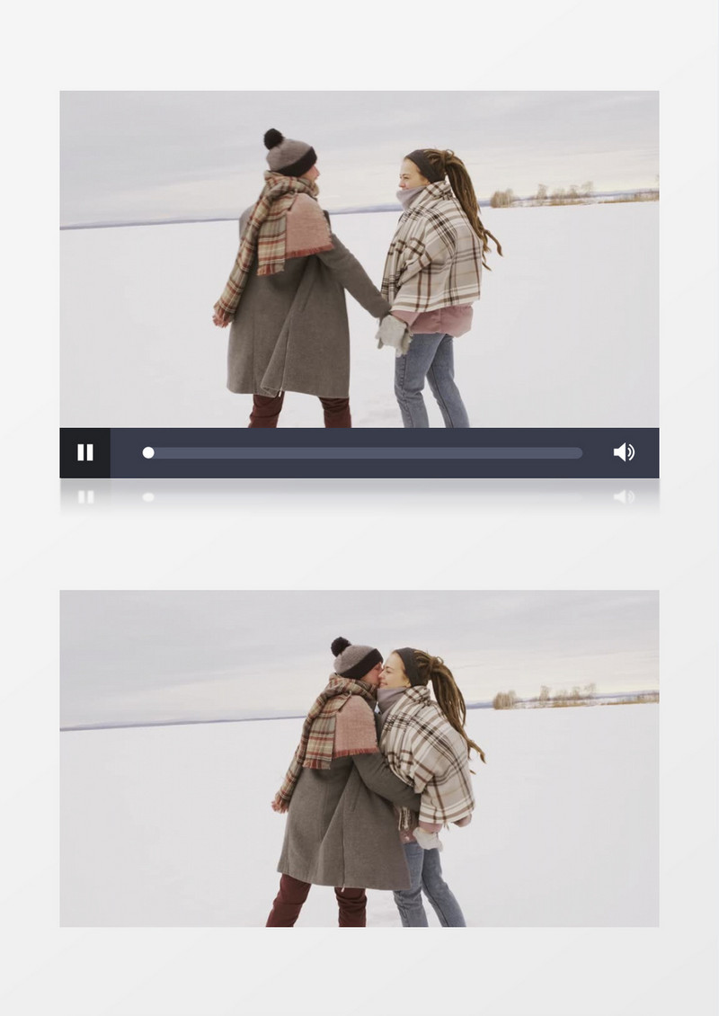 情侣二人在雪地拥抱实拍视频素材