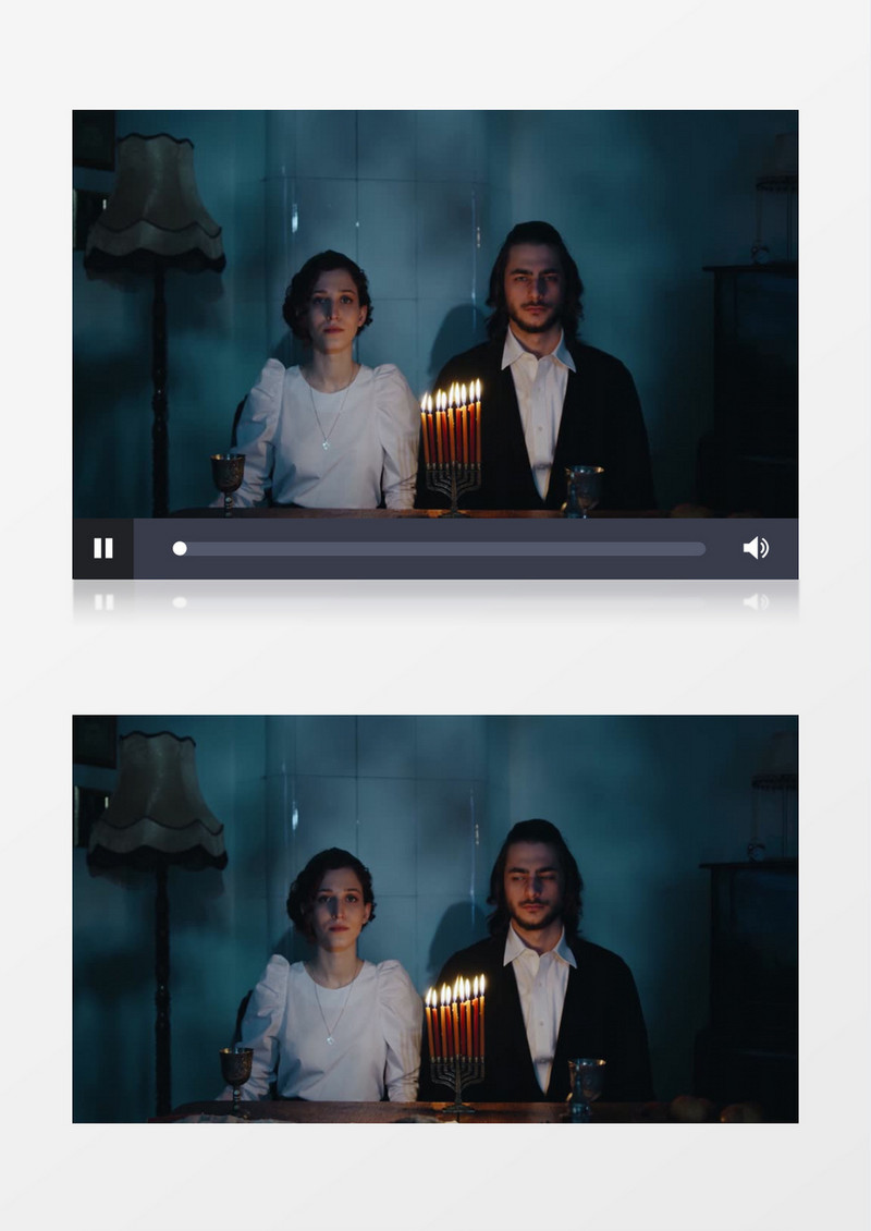 夫妻二人在烛光下神情诡异的看着前方实拍视频素材