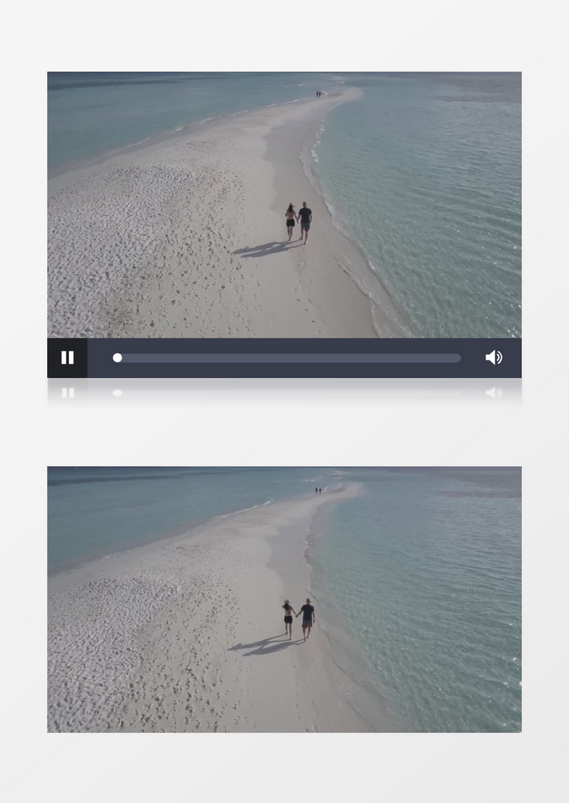 航拍牵手漫步在海边的情侣实拍视频素材