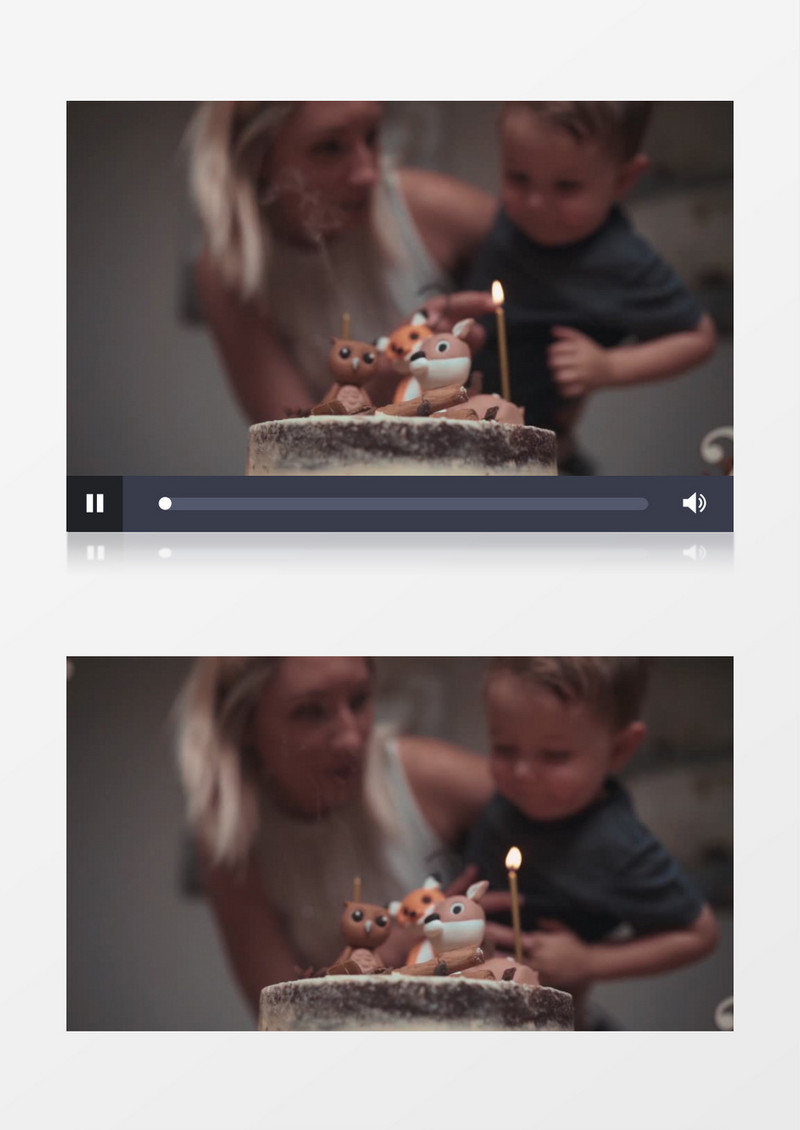 妈妈帮男孩吹灭生日蛋糕蜡烛实拍视频素材