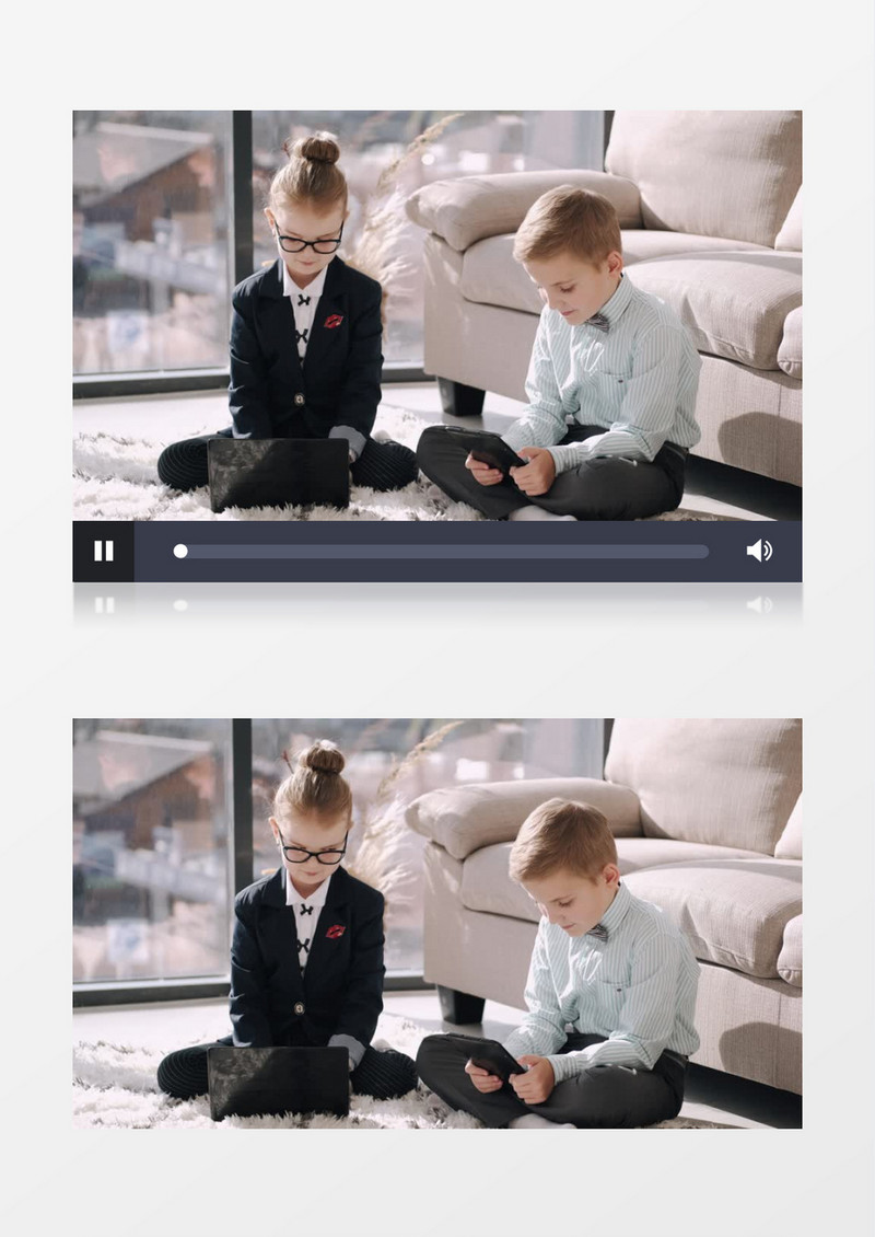两个小朋友坐在地毯上玩电子产品实拍视频素材