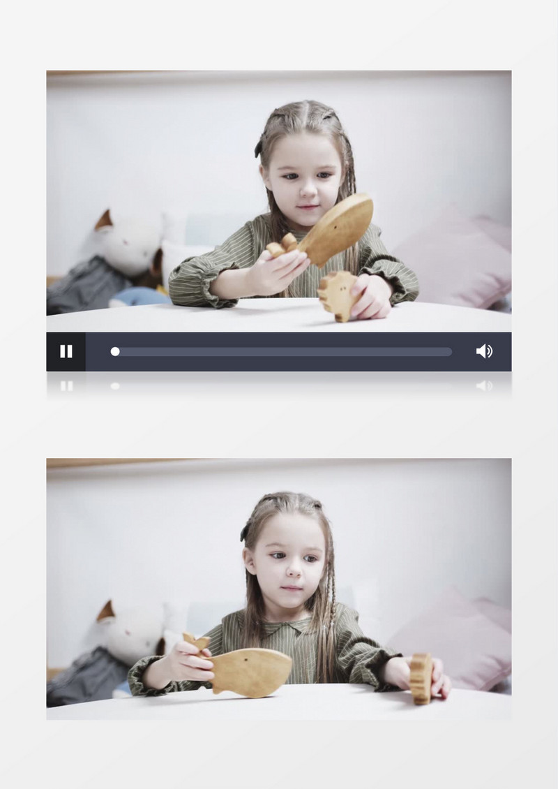可爱的小女孩在拿着木质的小鱼玩实拍视频素材