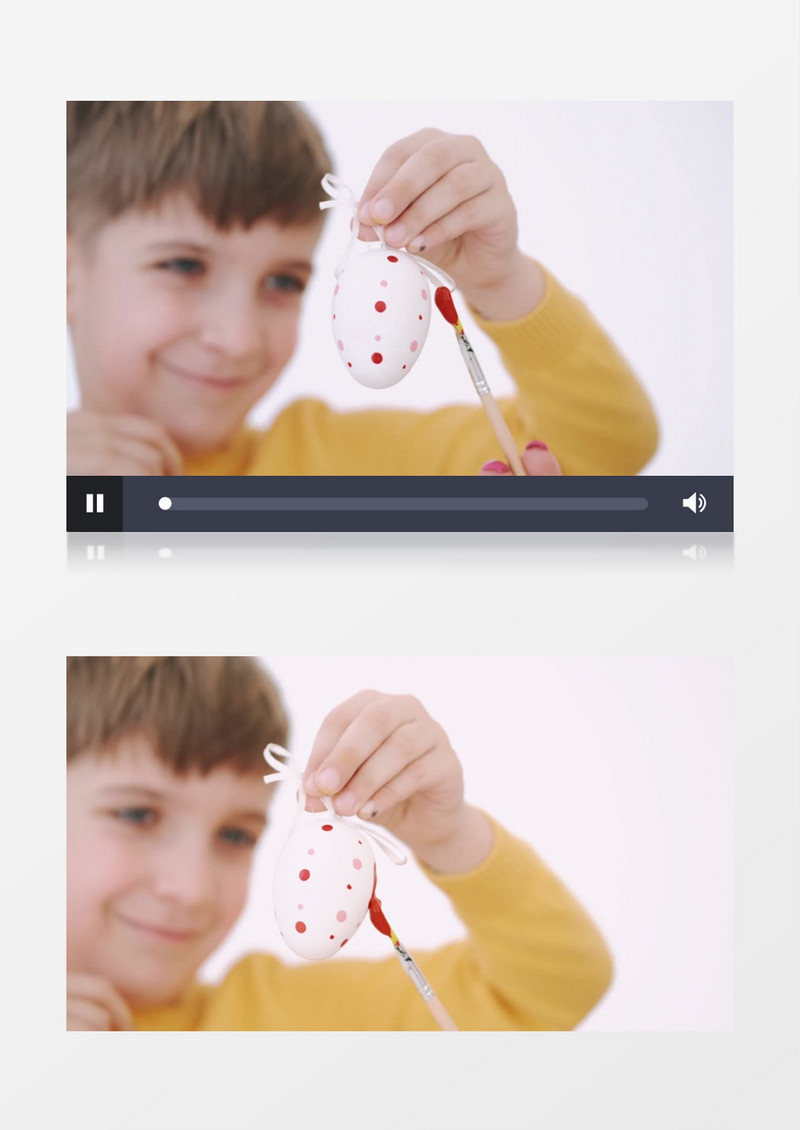 小男孩拿着彩蛋在涂颜色实拍视频素材