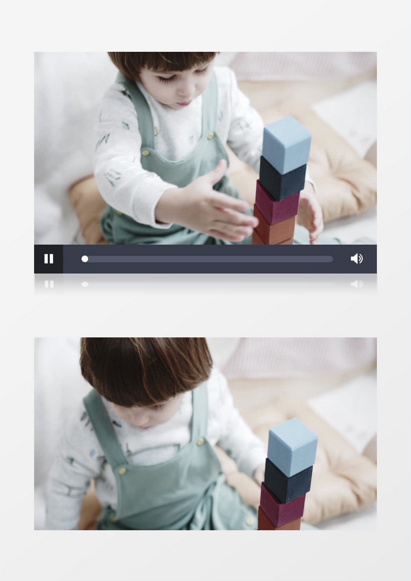 小男孩拿着小飞象在玩积木实拍视频素材