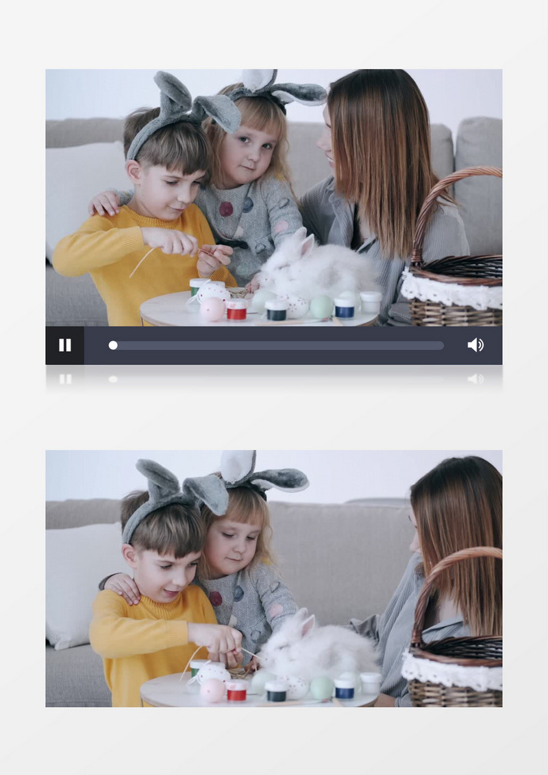 妈妈陪着两个宝宝在给兔子喂食实拍视频素材