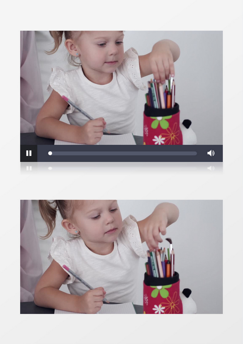 小女孩在选笔筒的铅笔画画实拍视频素材