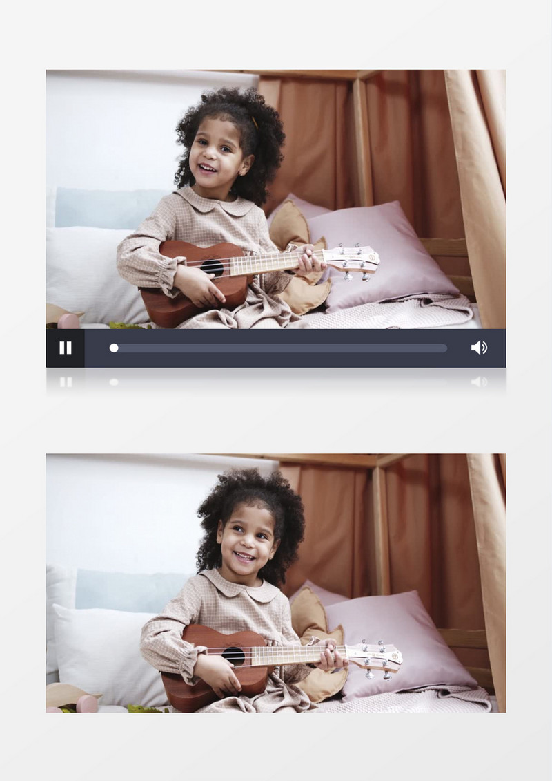 小女孩在开心的弹吉他实拍视频素材