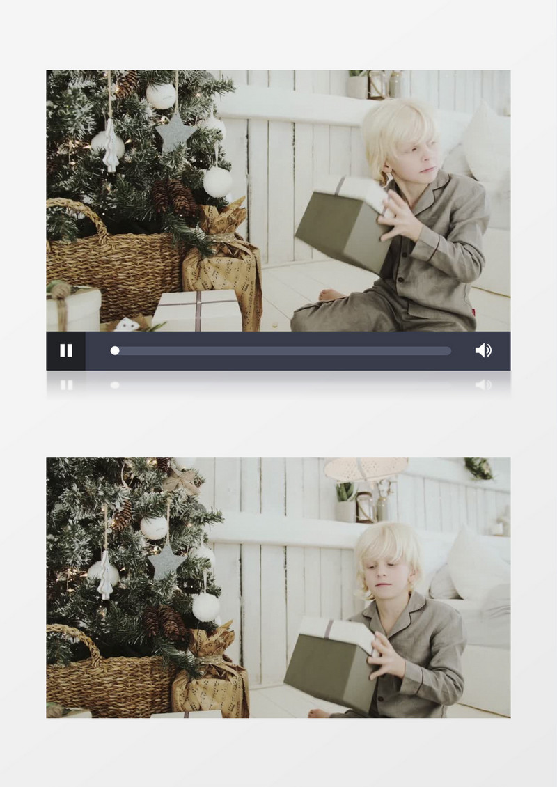 男孩一脸期待打开圣诞礼物实拍视频素材
