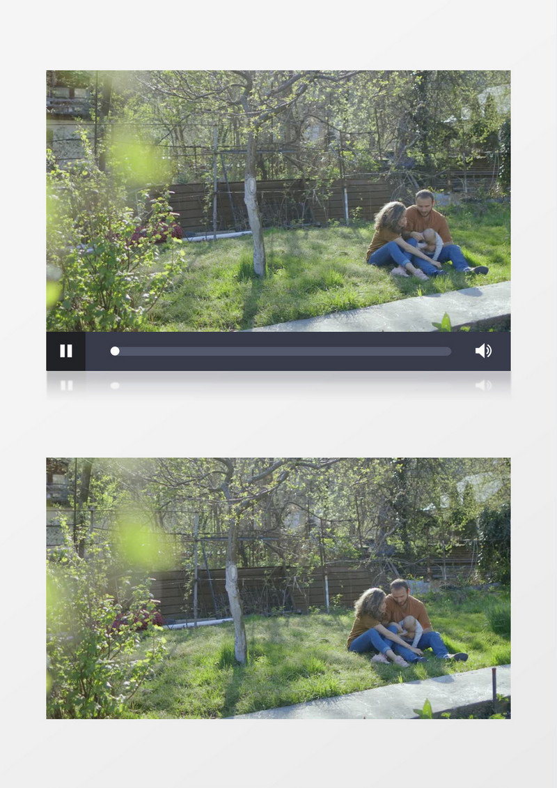 一家三口在草地上玩耍实拍视频素材