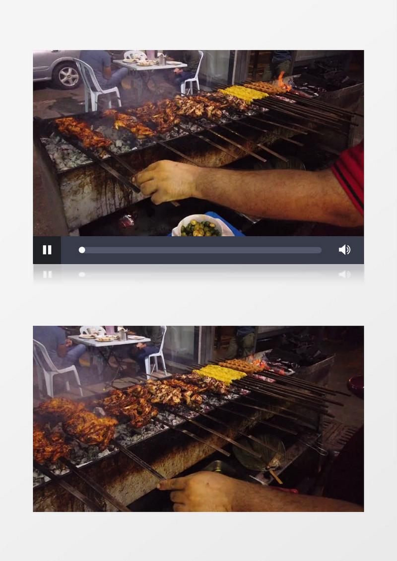厨师在烤架前烤鸡翅实拍视频素材