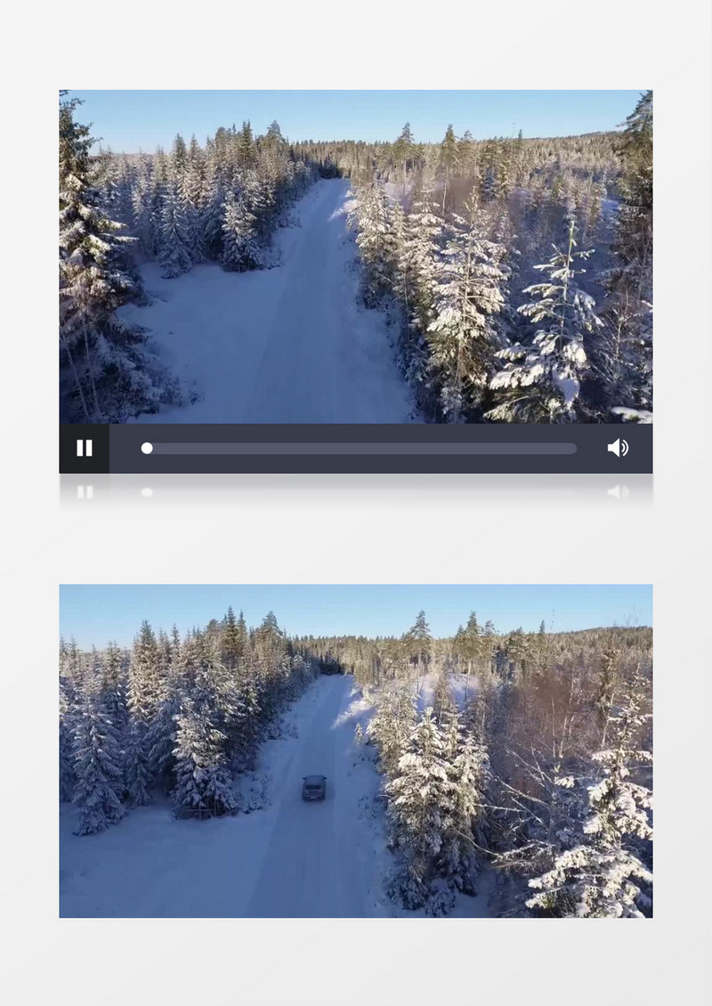 俯拍小车驶入雪景深处的道路实拍视频素材