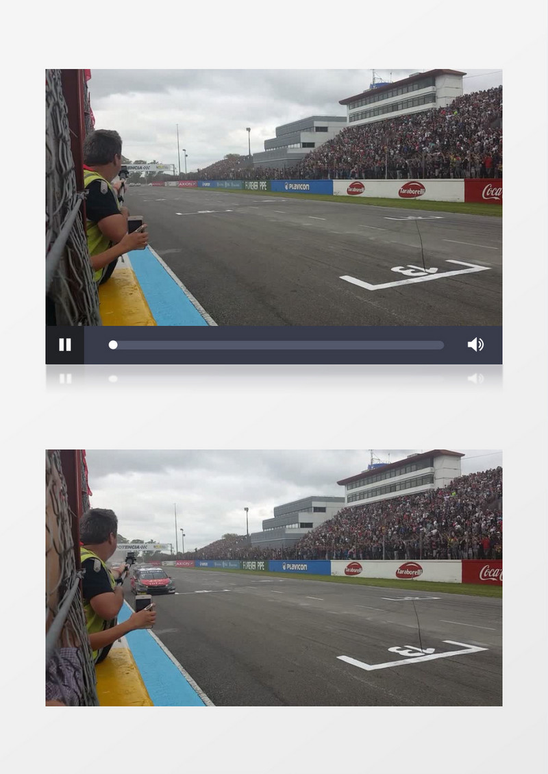 跑道上的赛车穿过的瞬间实拍视频素材
