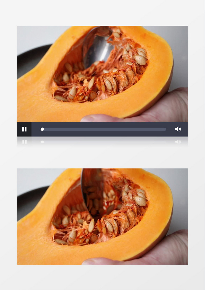用勺子刮掉南瓜中的瓤实拍视频素材