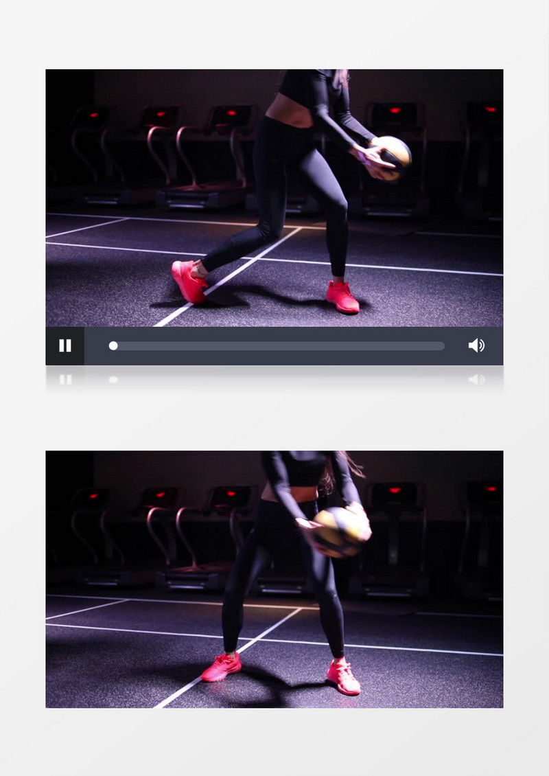 一个女人抱着球在做转体运动实拍视频素材
