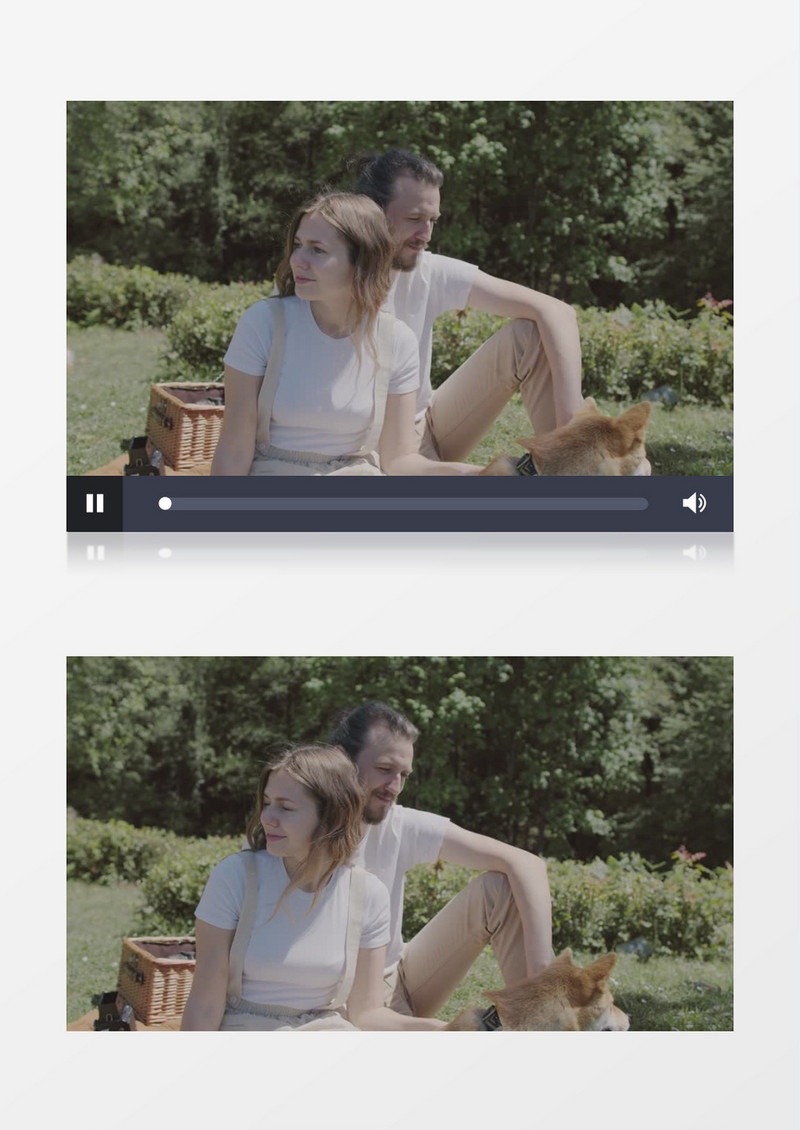 男女坐在草地上惬意的逗弄宠物实拍视频素材