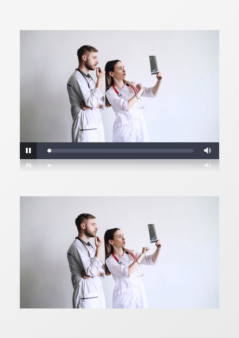 两个医生在看患者拍的X光片实拍视频素材