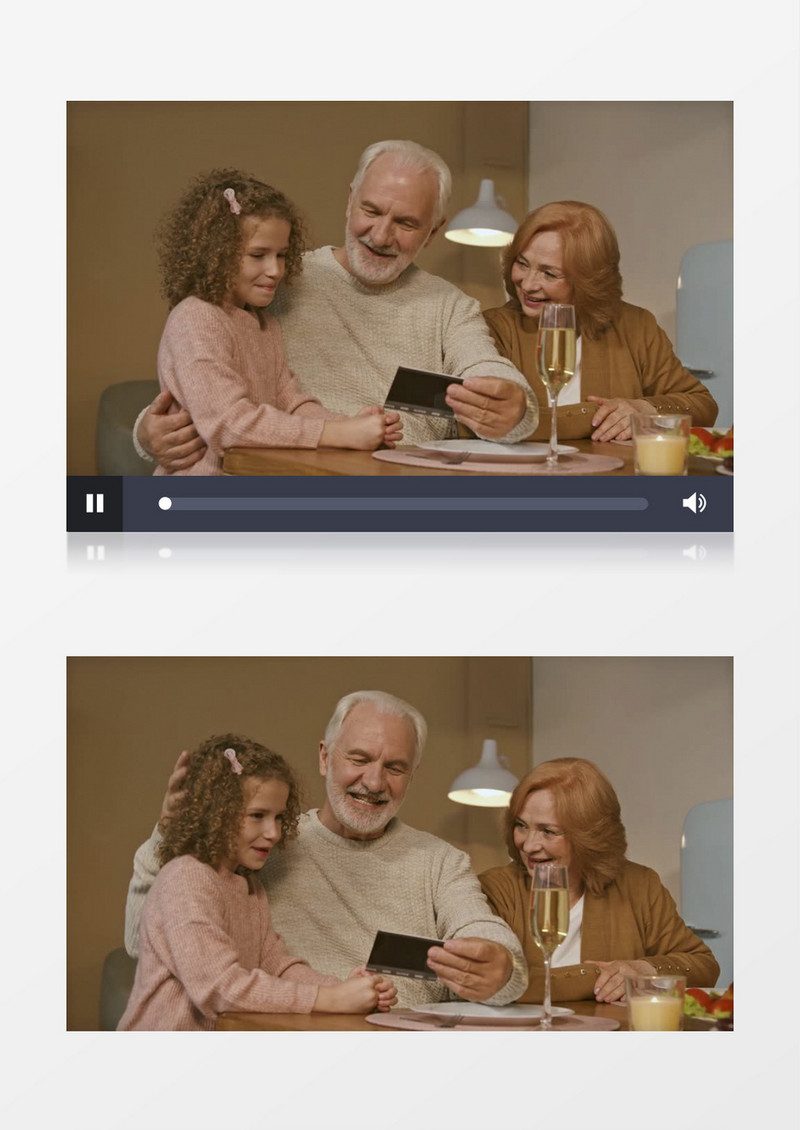 爷爷奶奶在给孙女展示照片实拍视频素材