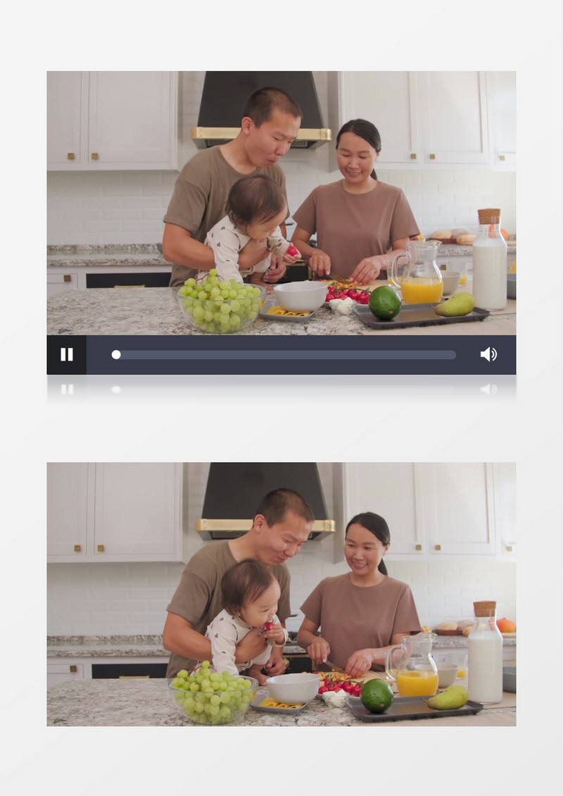 爸爸抱着孩子在厨房宝宝拿起桌子上的圣女果实拍视频素材