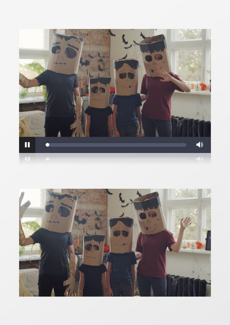 一家人带着纸板做的面具对镜头挥手实拍视频素材