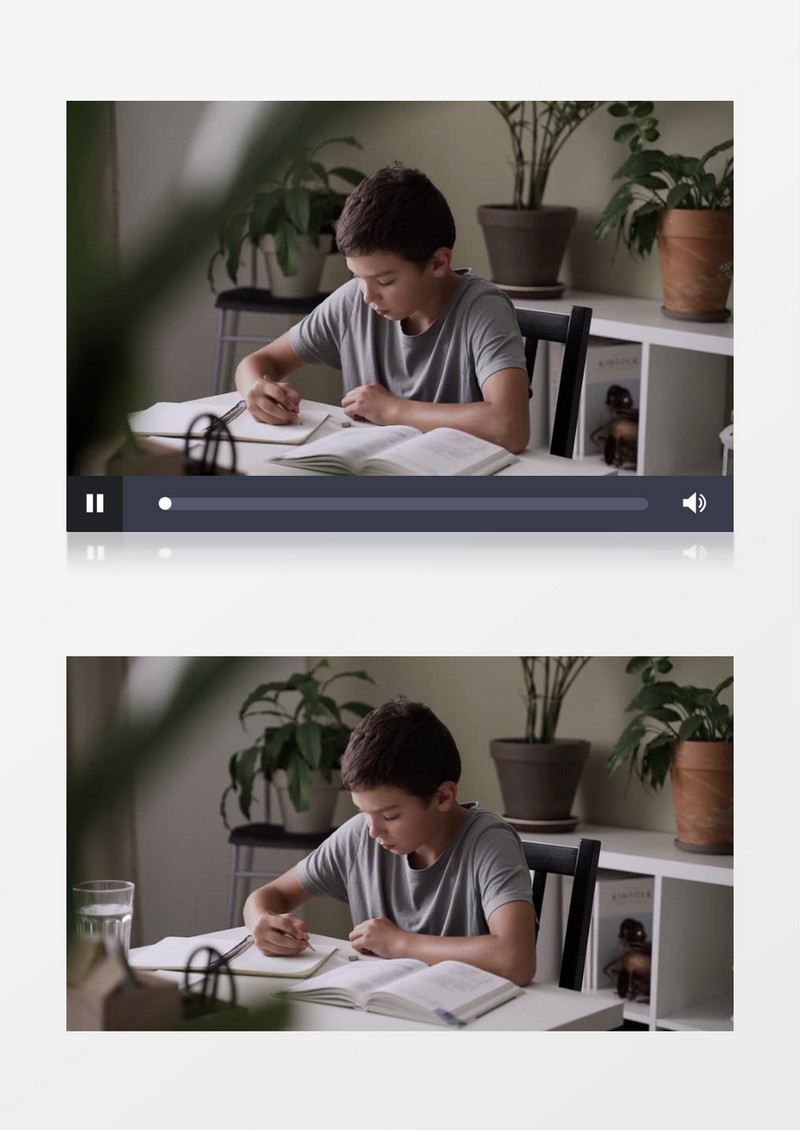 一个男孩在认真的写作业实拍视频素材