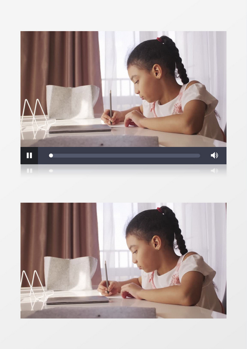 一个扎着马尾辫的女孩在认真写作业实拍视频素材