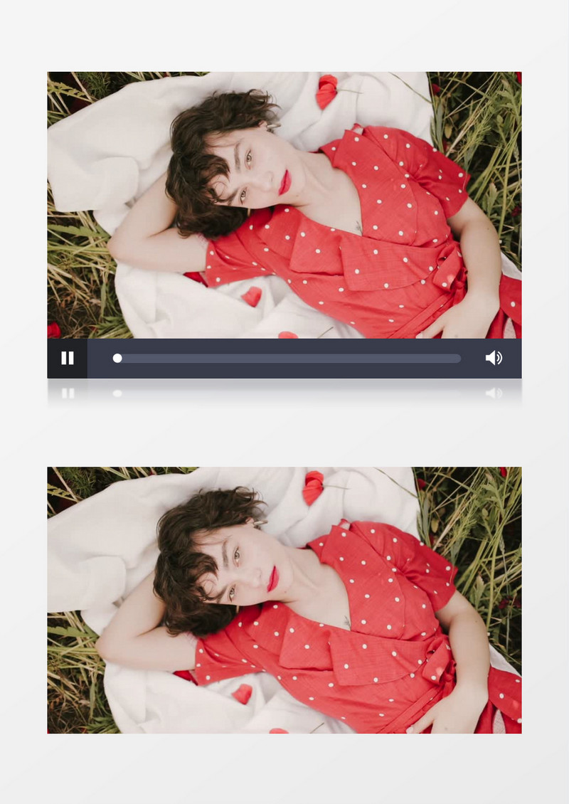 红衣女孩躺在草地上实拍视频素材