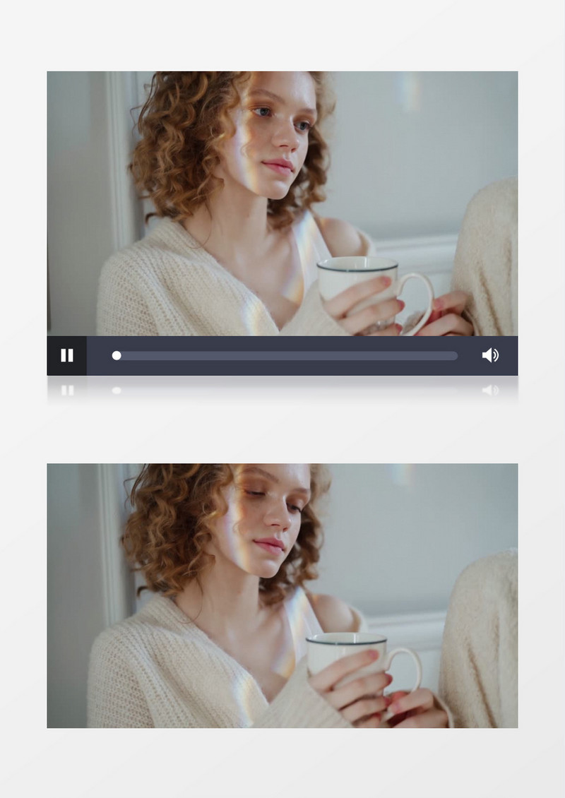女人抱着杯子坐着实拍视频素材