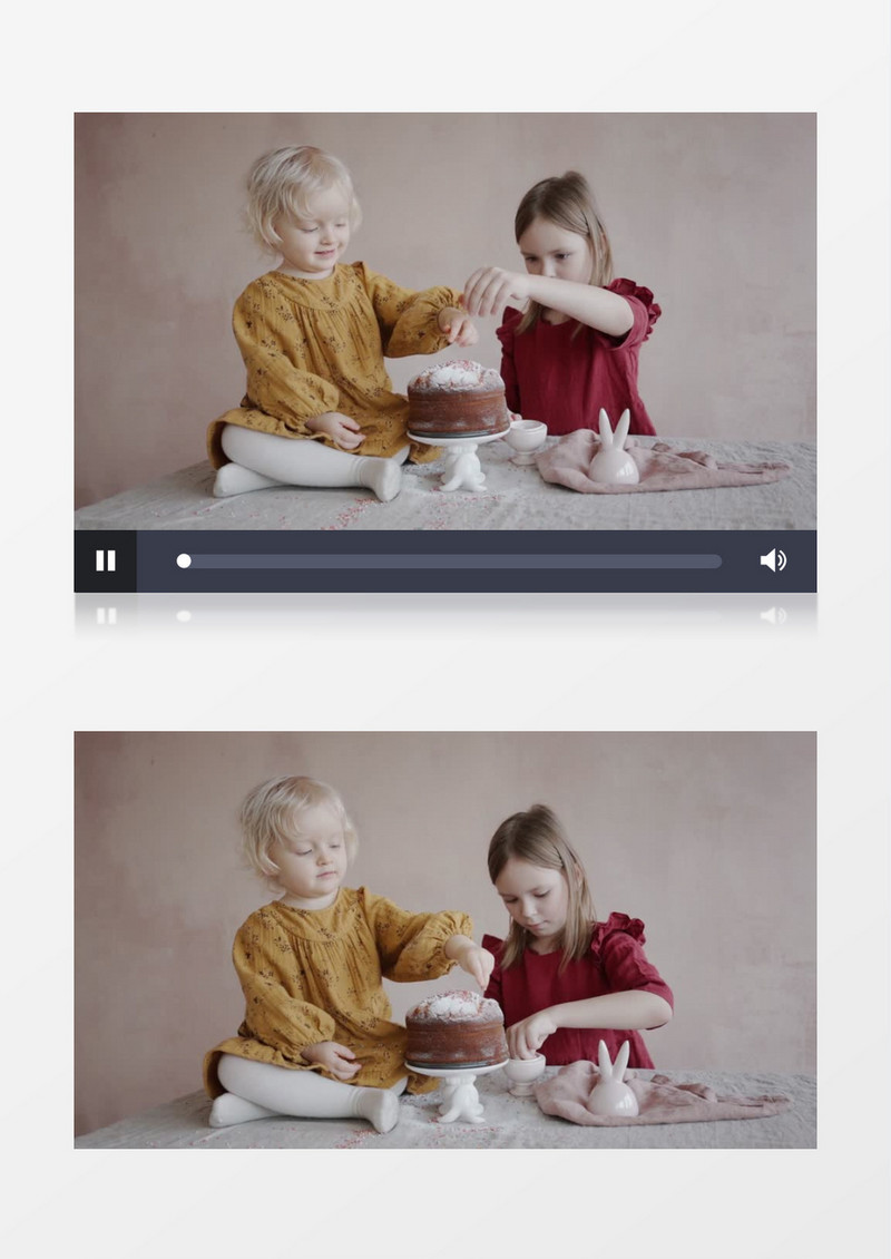 两个小女孩在给蛋糕撒糖霜实拍视频素材