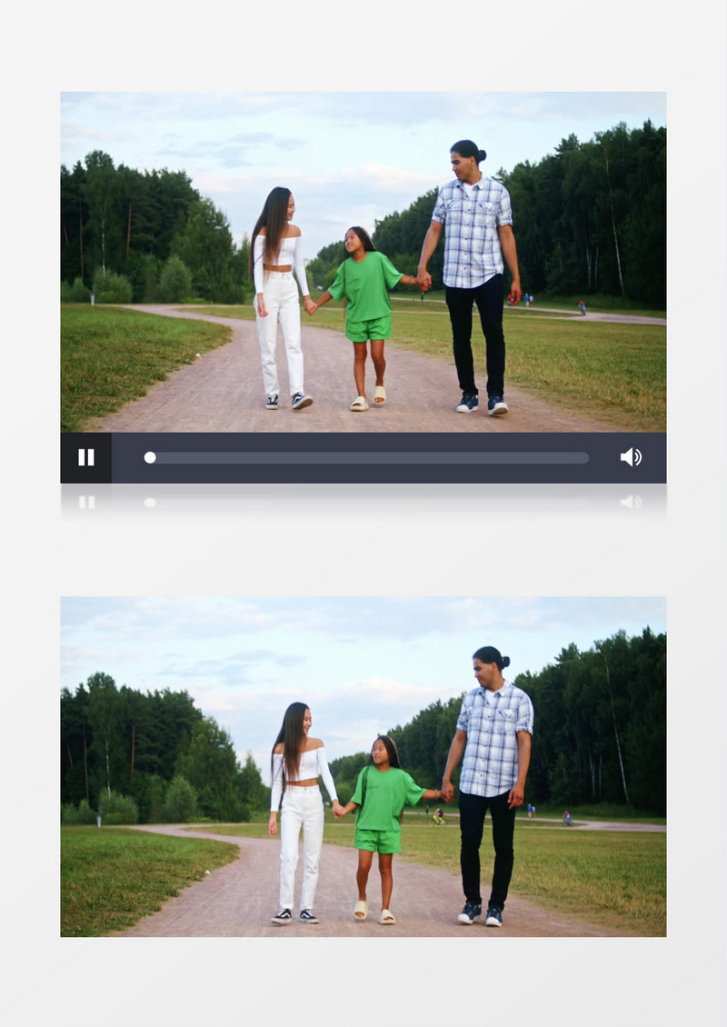爸爸妈妈牵着小女孩在公园散步实拍视频素材