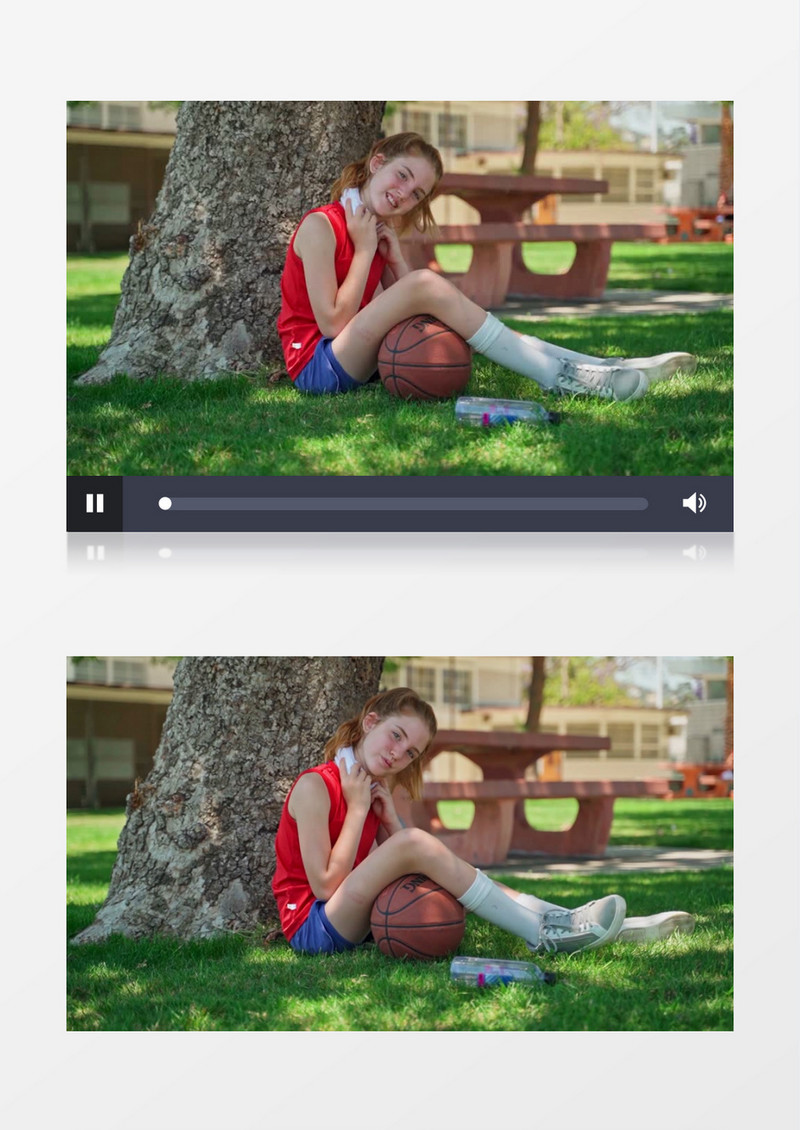 小女孩拿着篮球在草地上休息实拍视频素材