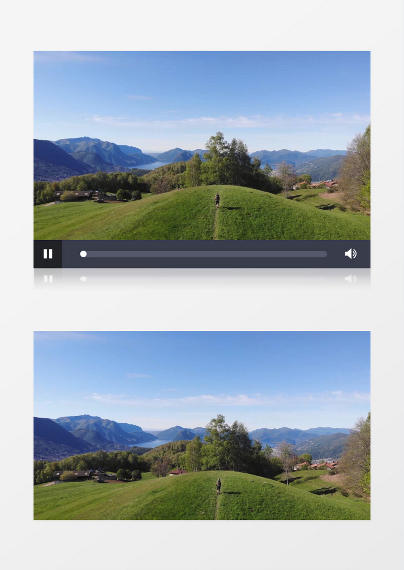 郊区嫩绿的草地和远处壮丽山河实拍视频素材