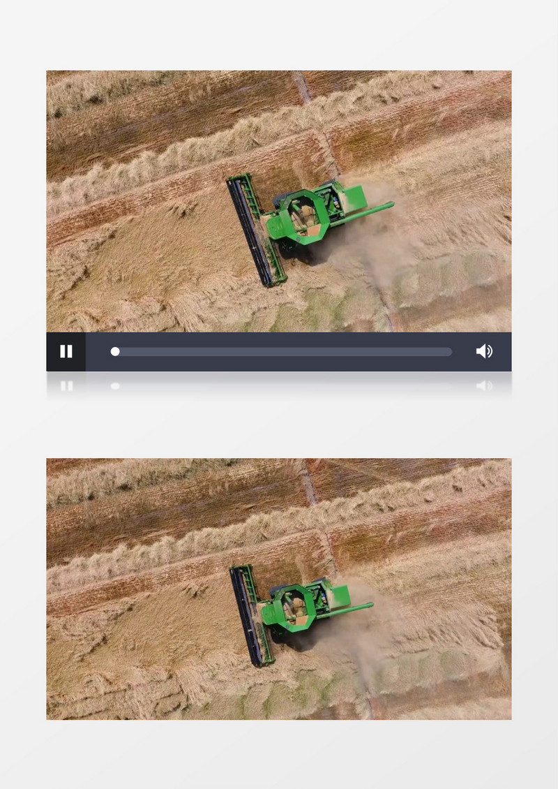 收割机在土地上收割农作物实拍视频素材