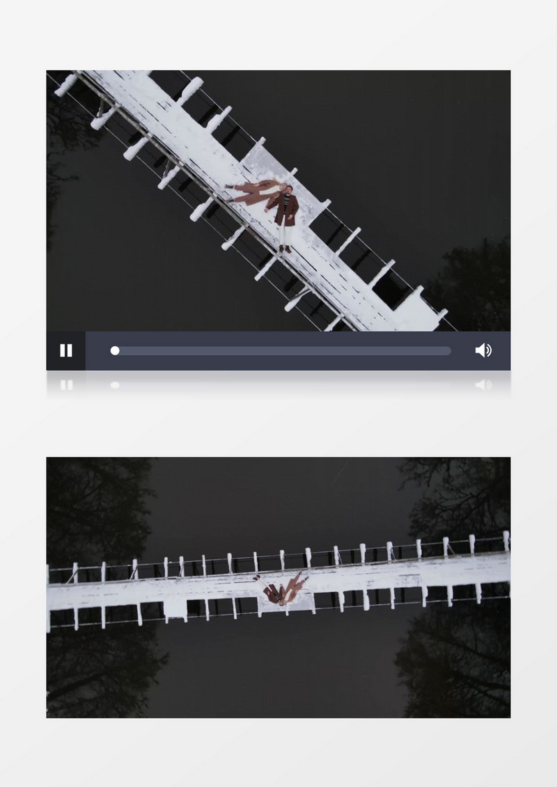 一对情侣躺在被雪覆盖的吊桥上实拍视频素材